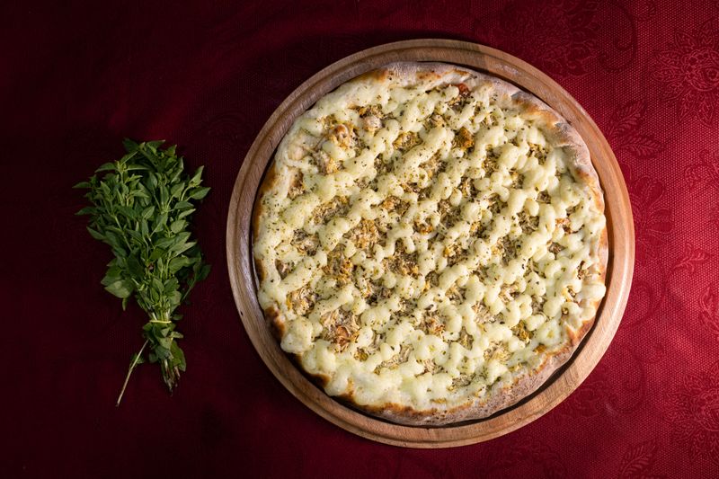 Garlic bread with herb butter and melted mozzarella