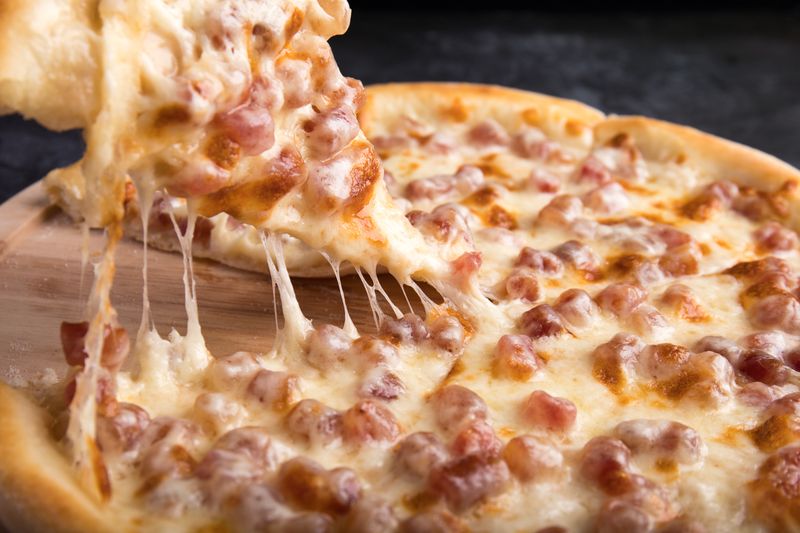 Pepperoni pizza with extra pepperoni and melted cheese